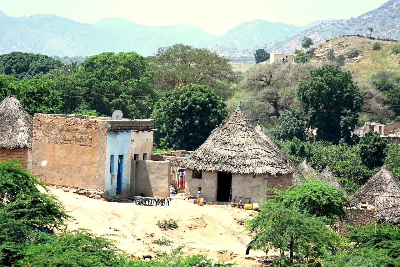 Traditional highland village with thatched agdo houses in the Eritrean countryside